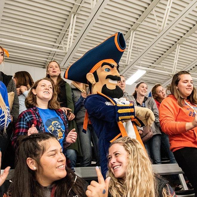 Max the Marauder in a crowd of students at a Marauders Athletics game.